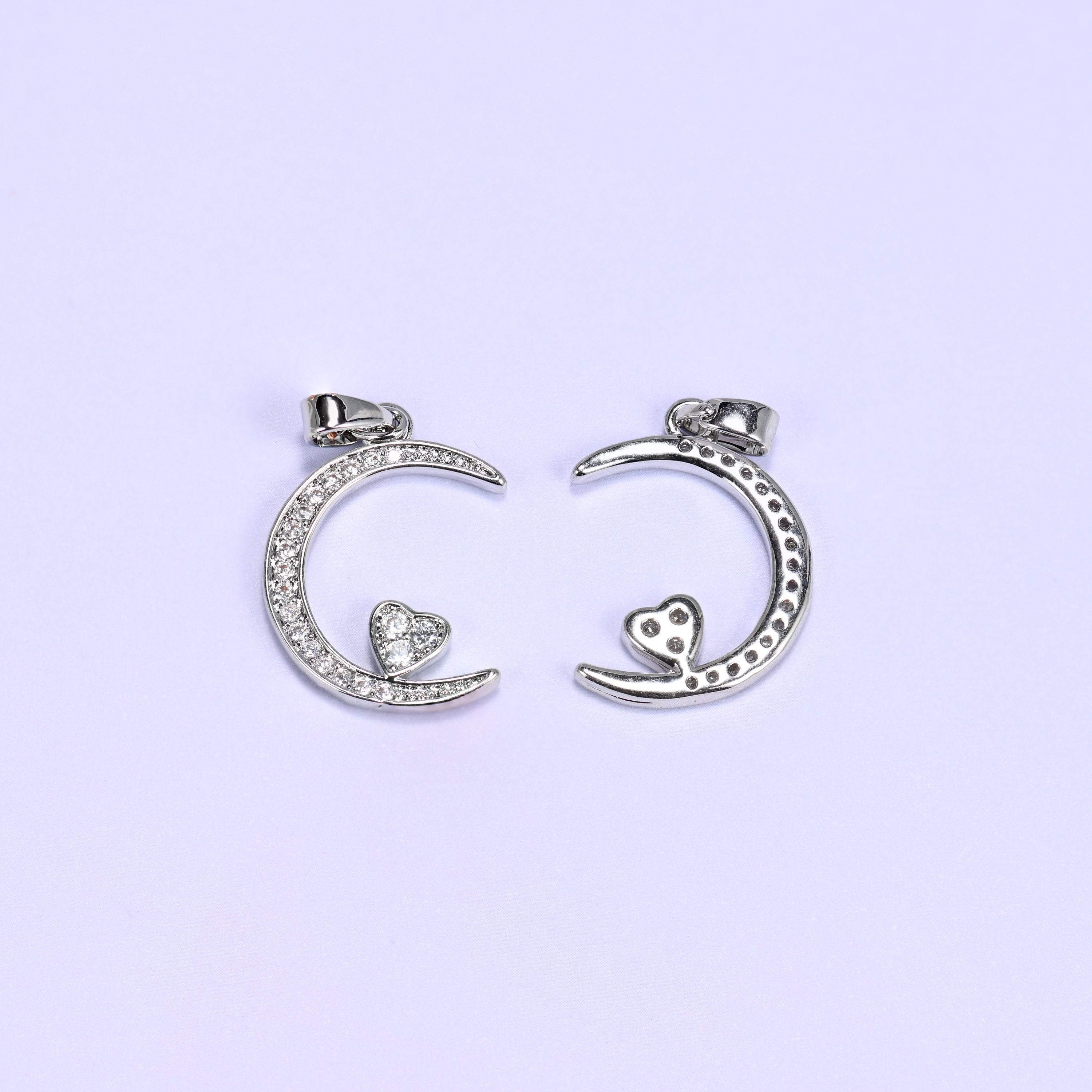 18K Gold Plated Brass Moon Heart Charm Pendant fully paved in sparkling clear zircon with a small heart accent nestled in the crescent