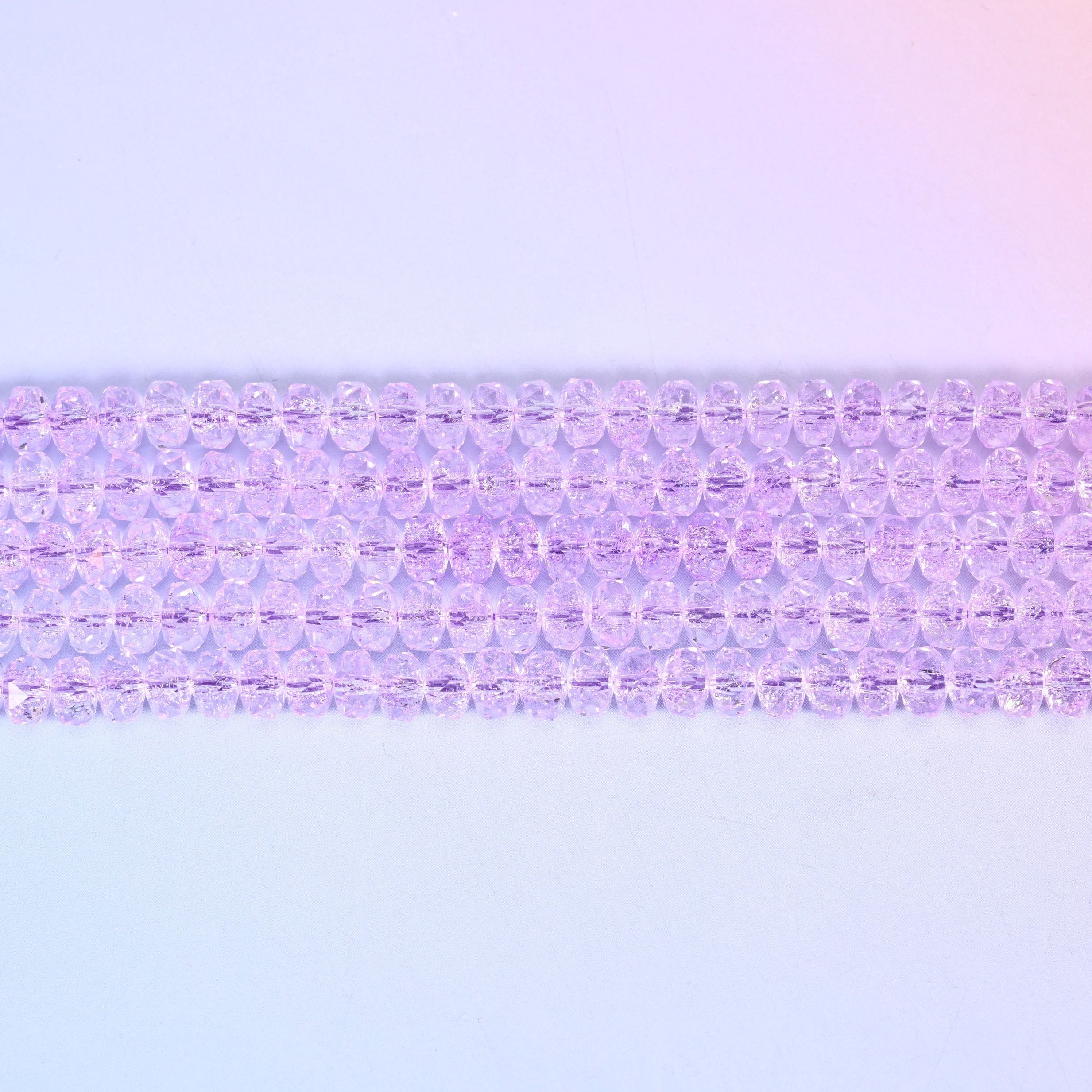 Transparent Purple Faceted Rondelle Glass Beads in pale violet