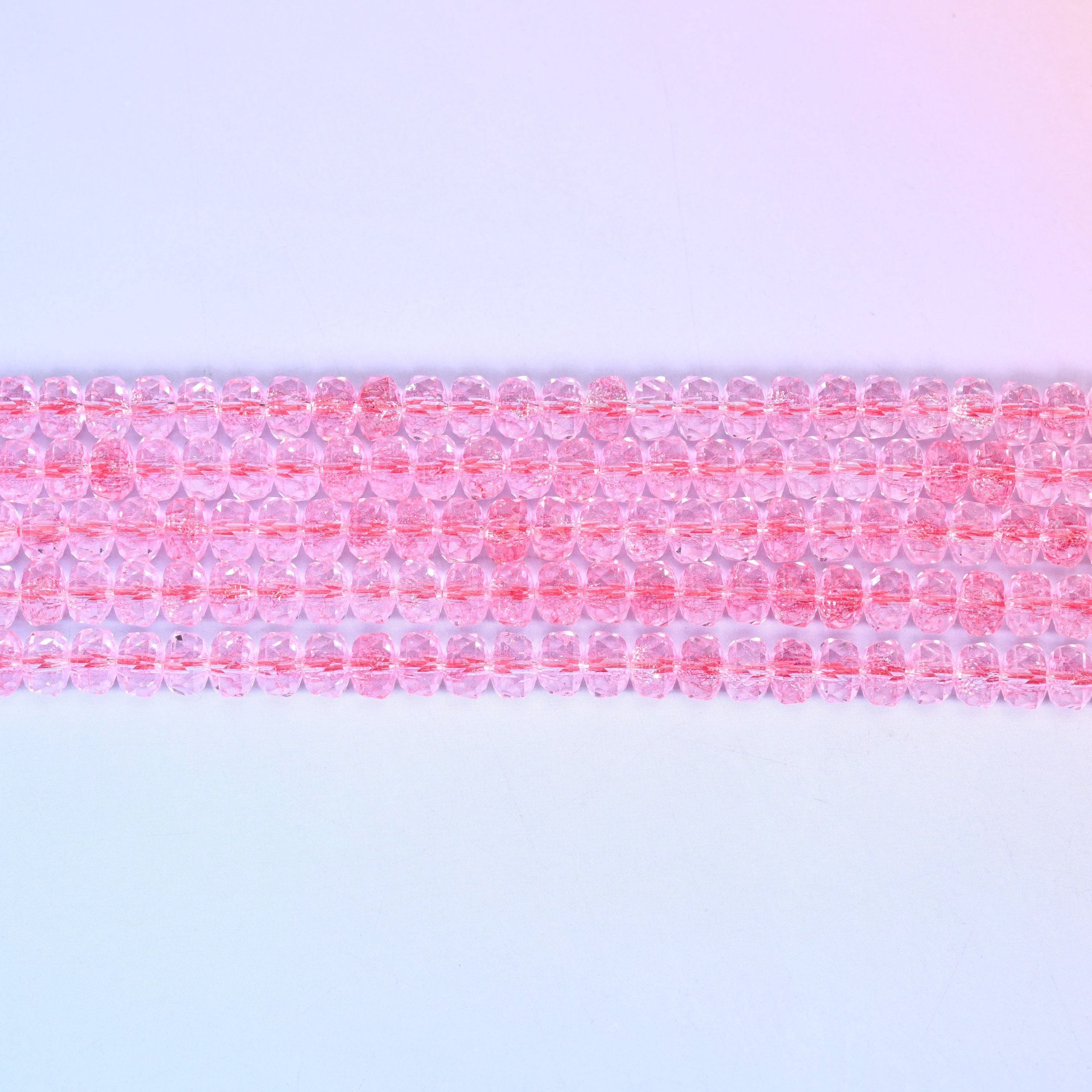 Transparent Pink Faceted Rondelle Glass Beads in bright rose-pink