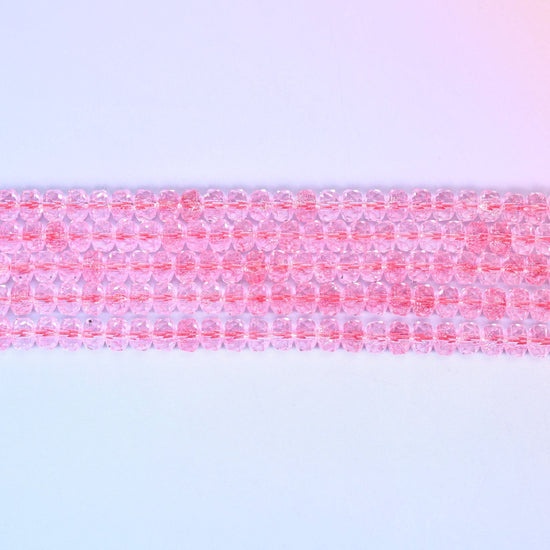 Transparent Pink Faceted Rondelle Glass Beads in bright rose-pink
