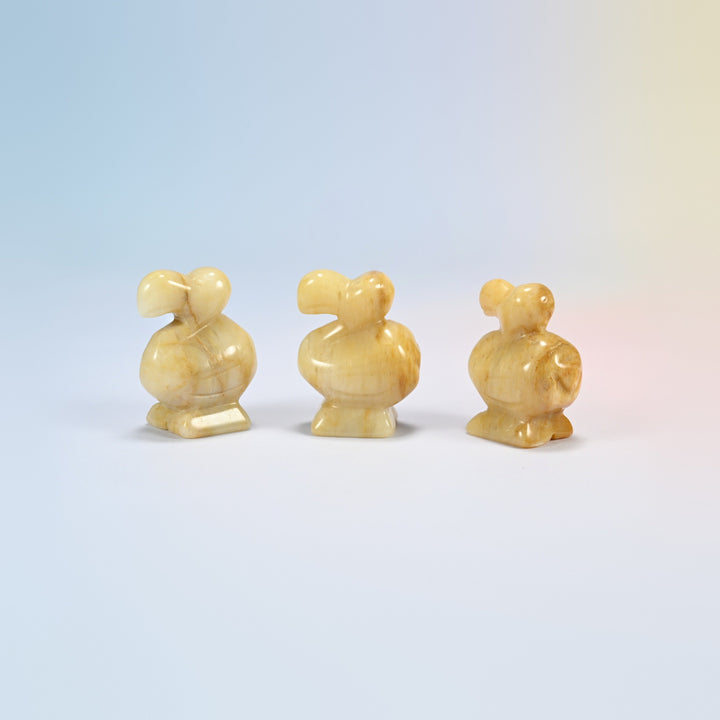 Three yellow jade dodo bird crystal carvings, 1.5 inch, honey yellow natural stone with soft banding