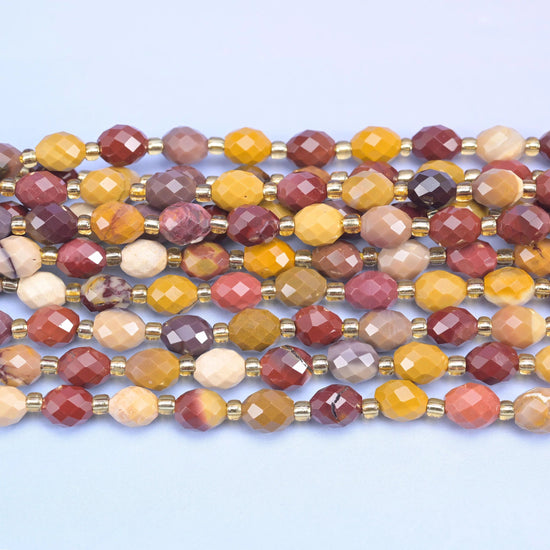 Faceted rice barrel cut mookaite jasper beads