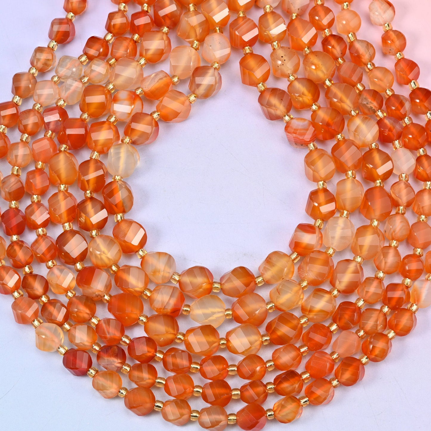 Faceted spiral twist cut natural orange carnelian beads