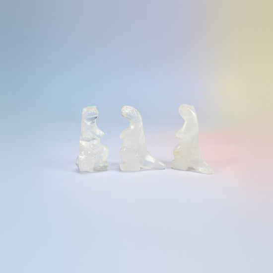Three clear quartz T-Rex dinosaur crystal carvings, 2 inch, milky clear natural stone