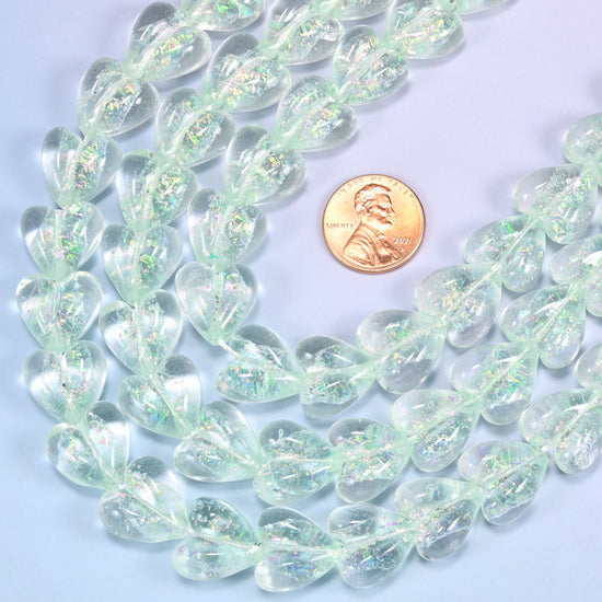 Clear pale mint glass heart beads with fine iridescent shimmer