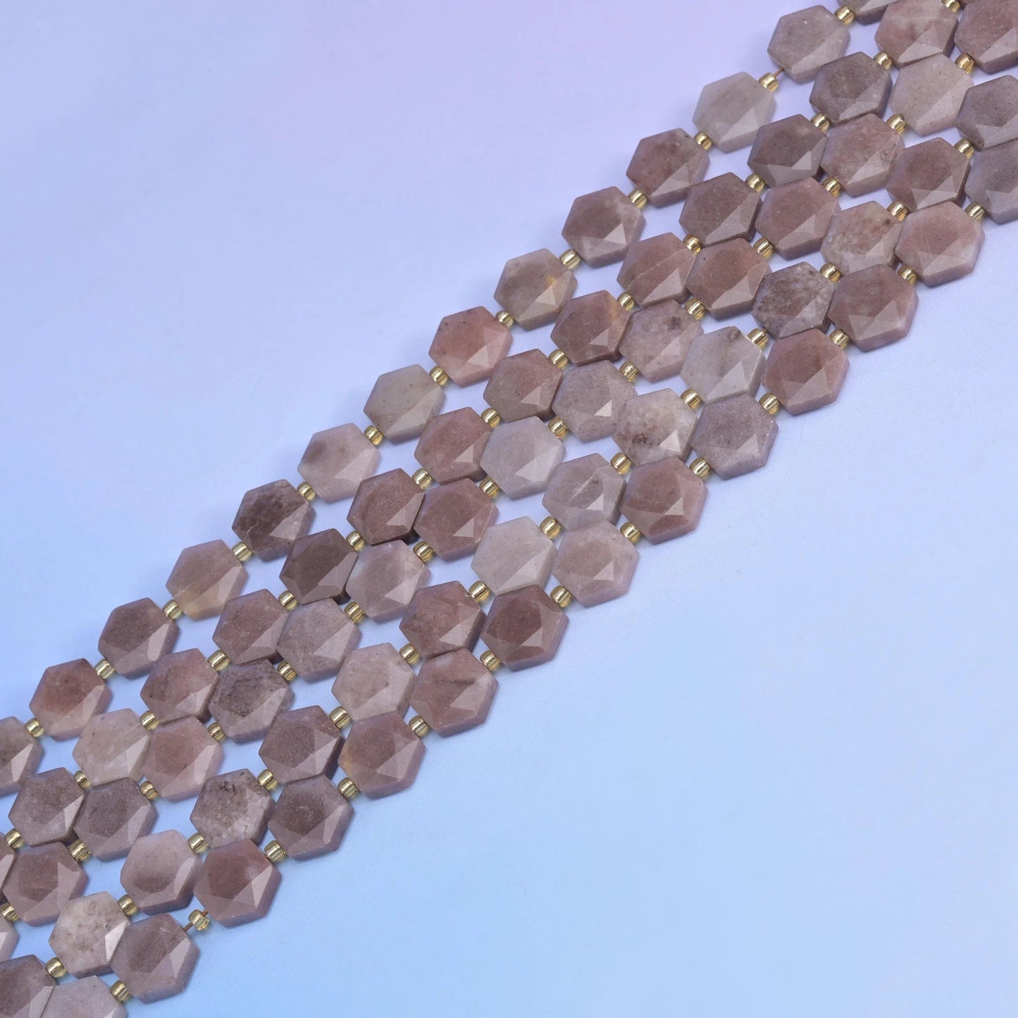 Purple Aventurine in dusty lavender-grey marbled with plum banding.