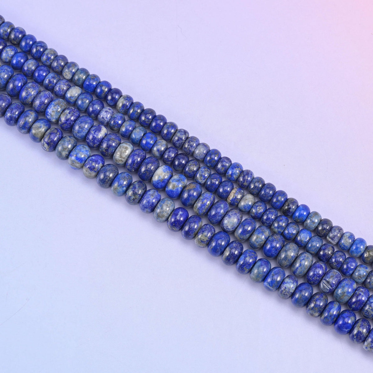 Lapis Lazuli rondelle beads in ultramarine blue with calcite and pyrite accents