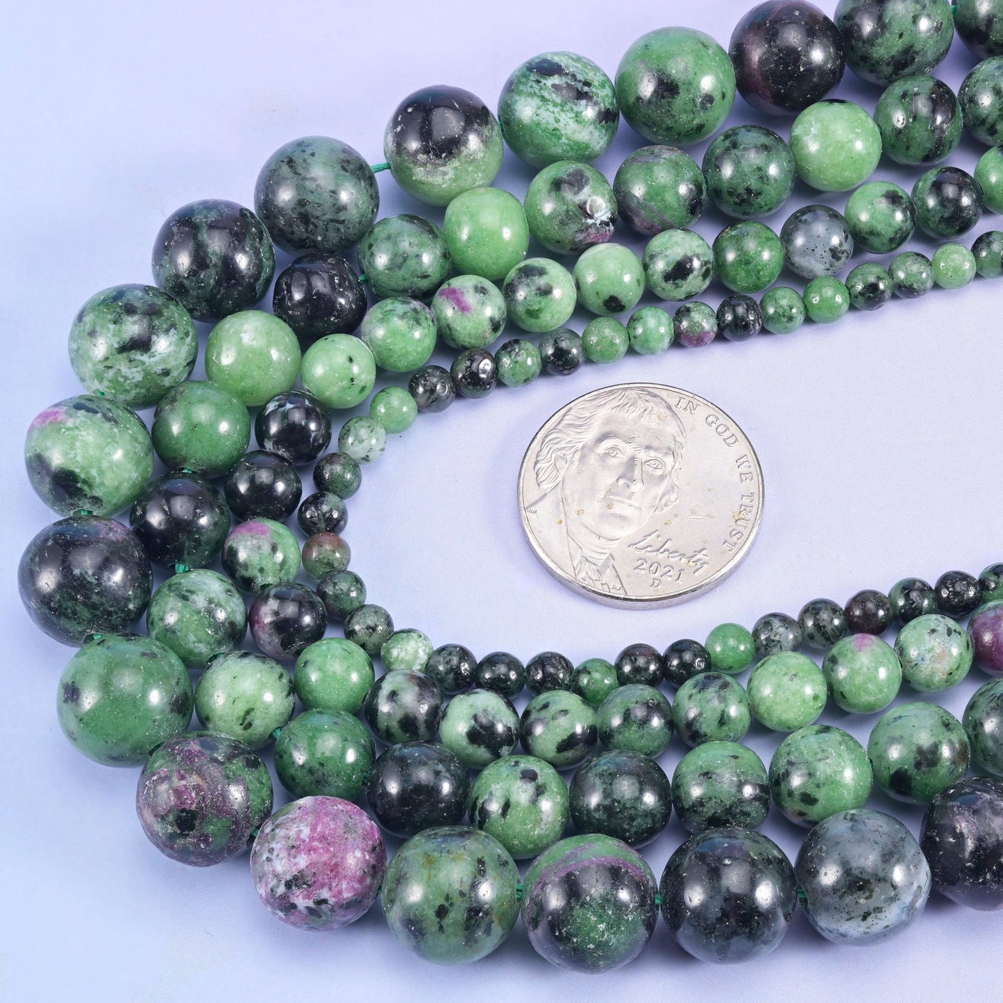 Ruby Zoisite beads in apple green with black hornblende and raspberry-pink patches