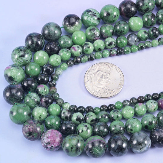 Ruby Zoisite beads in apple green with black hornblende and raspberry-pink patches