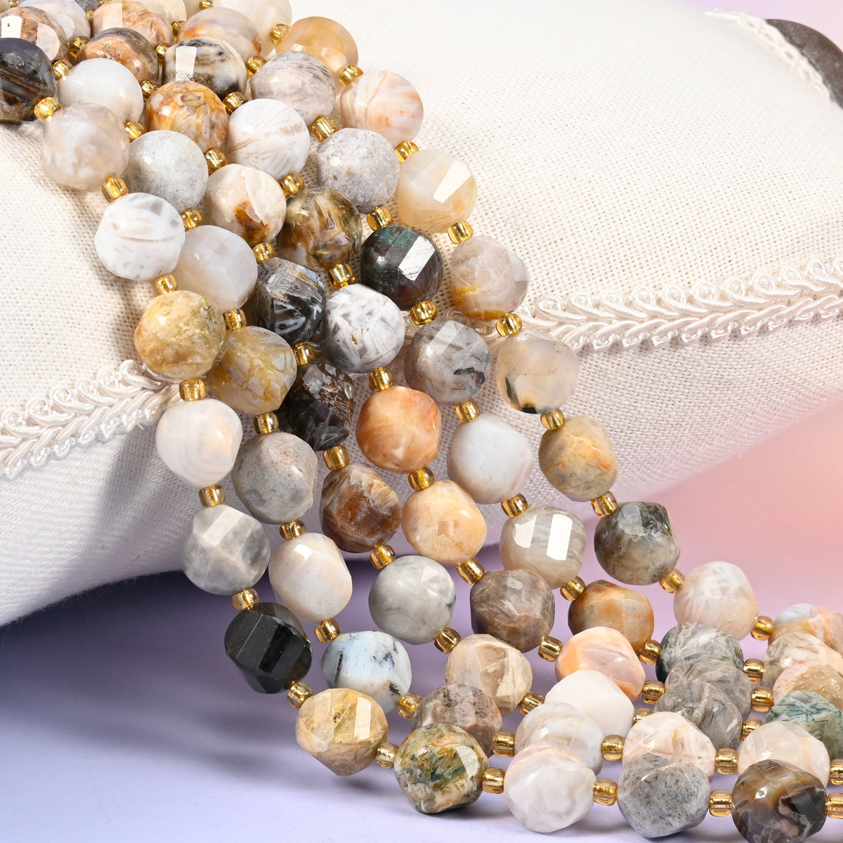Bamboo Agate natural stone beads, 10mm faceted spiral twist, cream, oatmeal and tan run through with apricot and grey-green