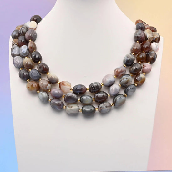 Botswana agate beads, oval egg shape, 10-17mm