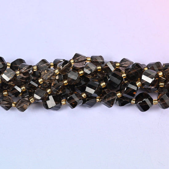 Smoky Quartz Faceted Spiral Twist Beads, translucent coffee brown deepening to near-black in the thicker beads