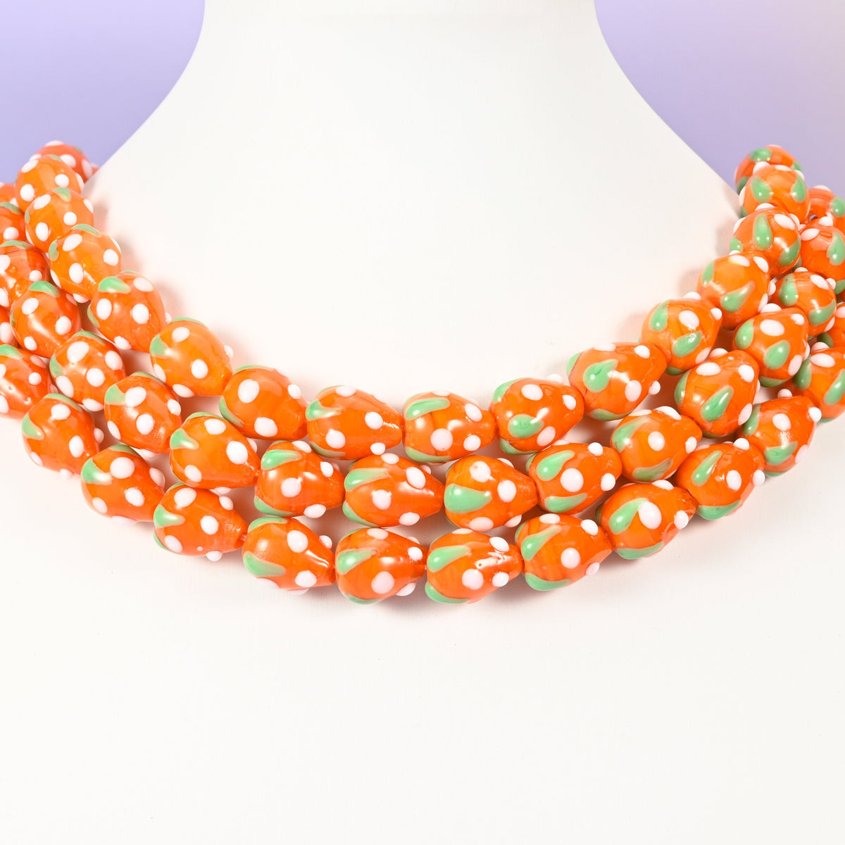Strawberry glass beads, orange with white dots, approximately 15.5x12mm