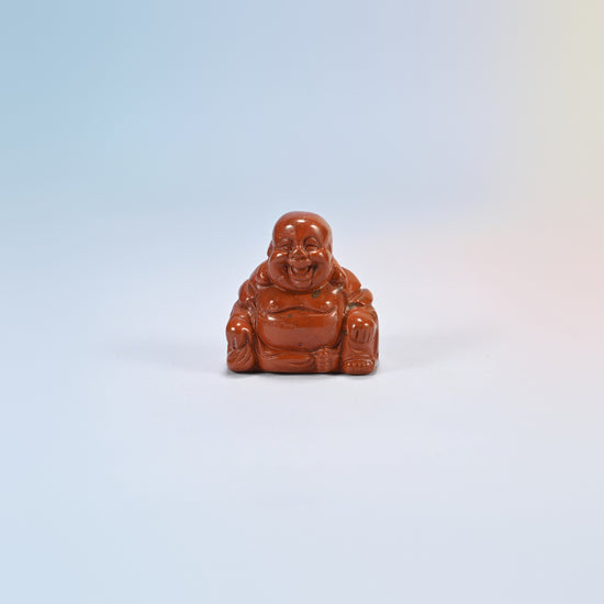 One red jasper laughing Buddha crystal carving, brick red natural stone