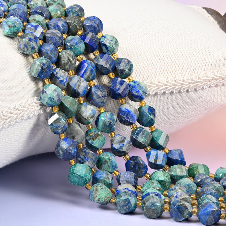 Phoenix Lapis lapis lazuli beads, 10mm faceted spiral twist, deep royal blue running into teal and green zones