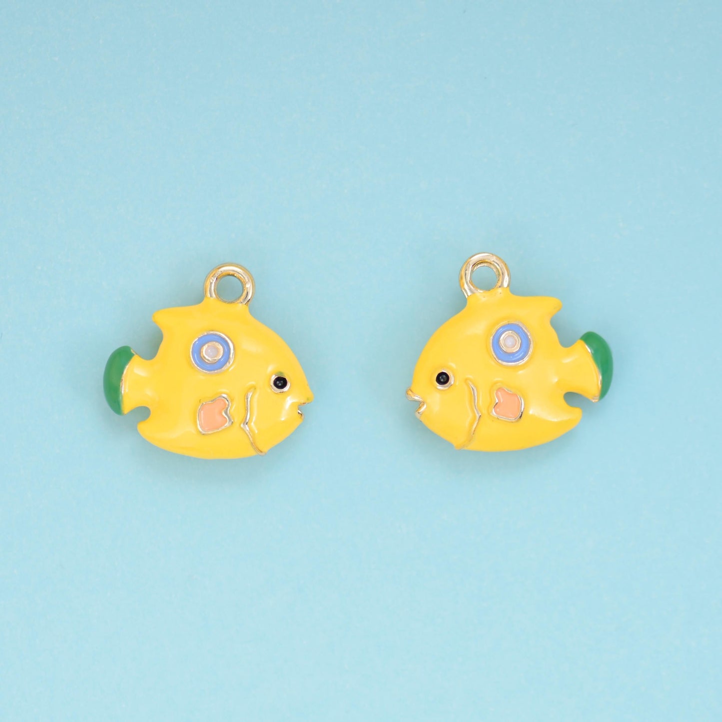 Enamel Yellow Tropical Fish Charm 16x15mm in buttercup yellow with mint-green fins and a pink cheek