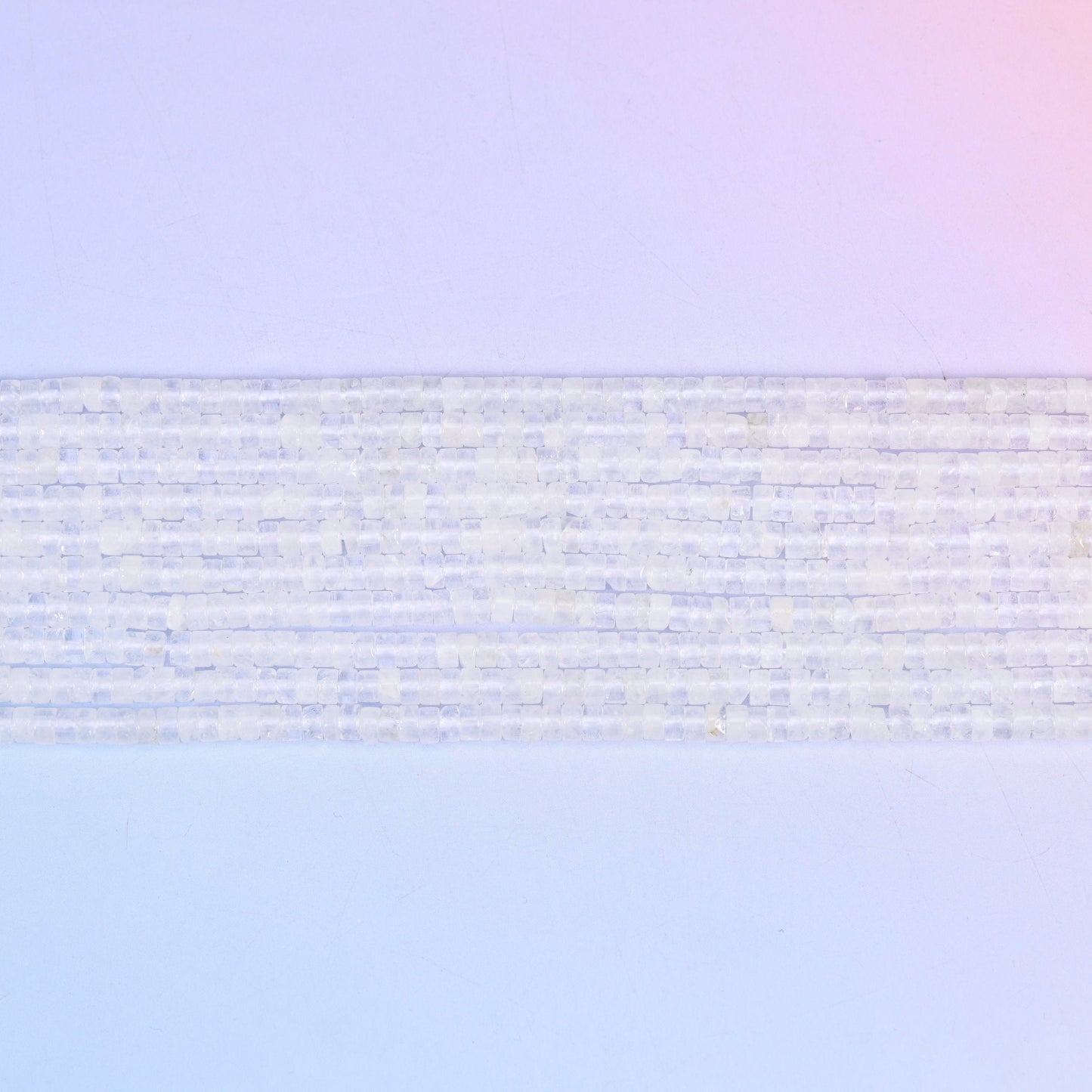 Clear Quartz Smooth Heishi Disc Beads 2x4mm in translucent white to crystal clear