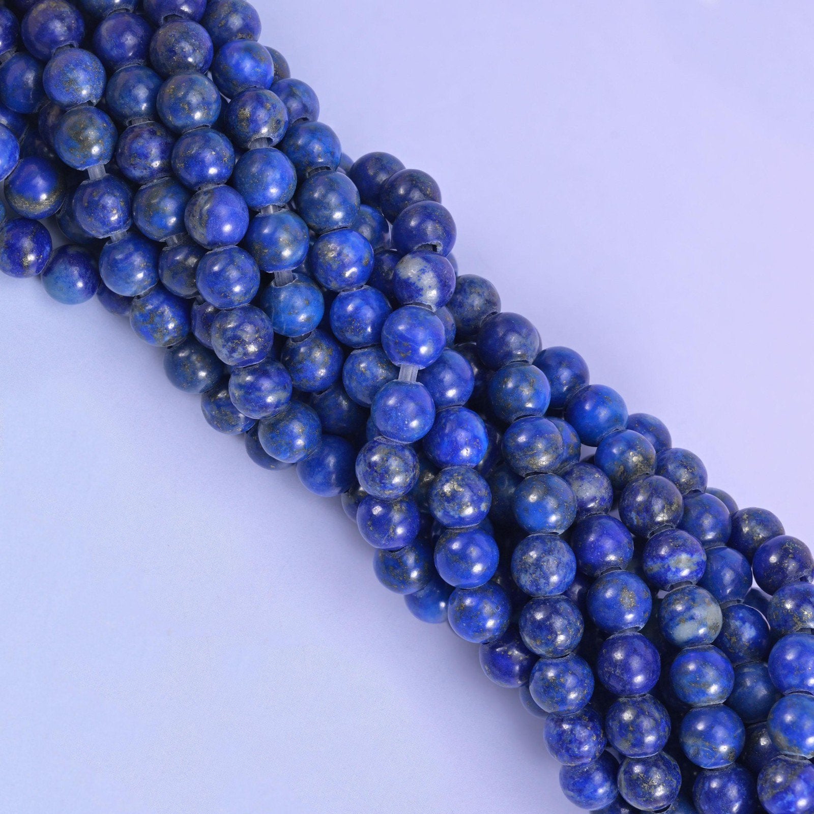 Smooth round cut lapis lazuli beads