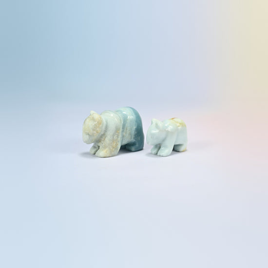 A 2 inch and a 1.5 inch amazonite bear crystal carving, light blue-green natural stone