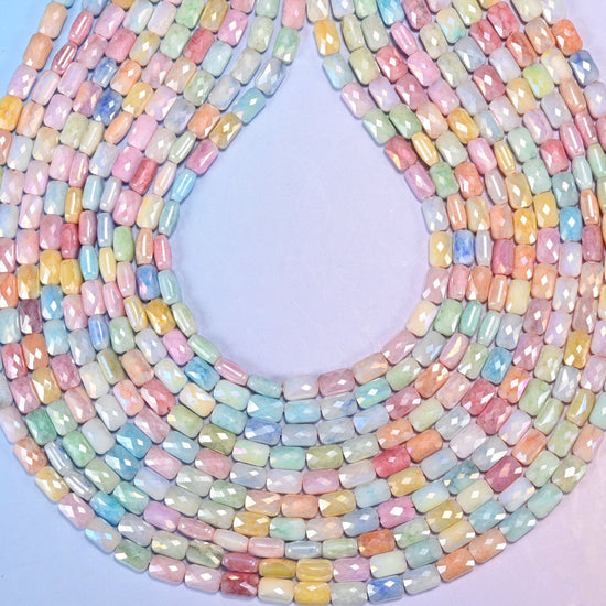 Faceted rectangle cut glass beads with a satin pearly lustre.