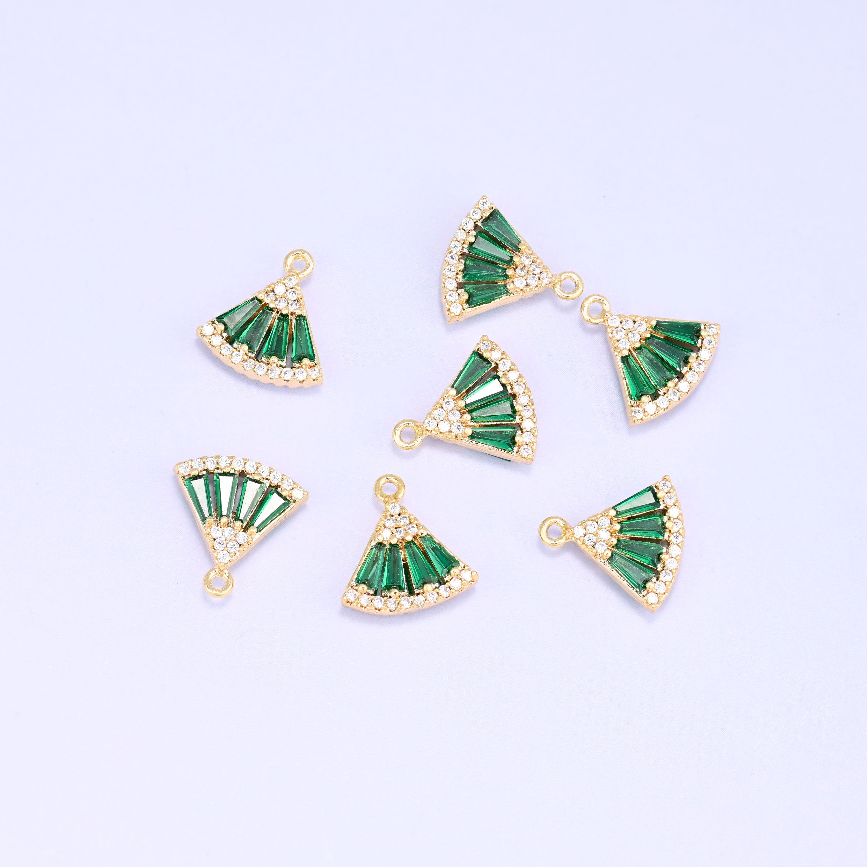 Small gold charms, seven 18K gold plated fan charms set with green cubic zirconia