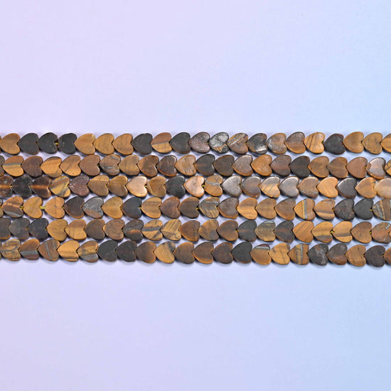 Matte Tiger Eye Flat Heart Beads in caramel, walnut and grey-brown banding