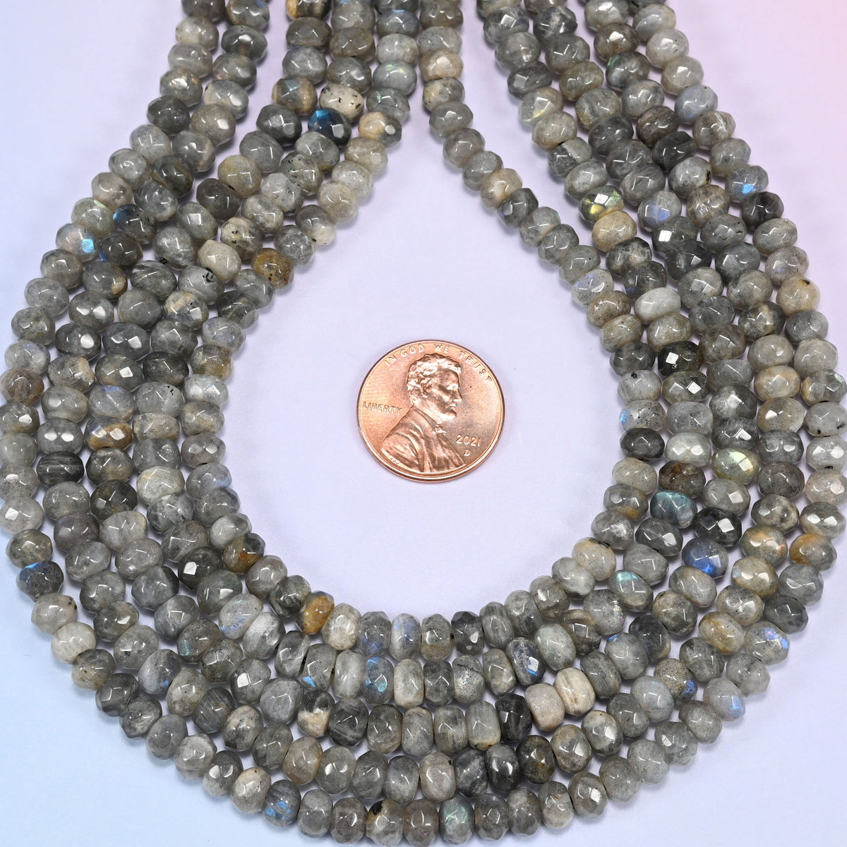 Gray Labradorite faceted rondelle beads in a teardrop loop, approximately 102 beads per 15 inch strand