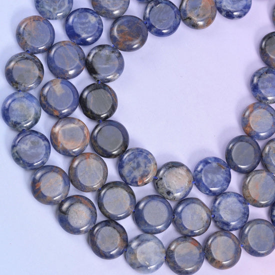 Sodalite coin beads, approximately 26 beads per strand