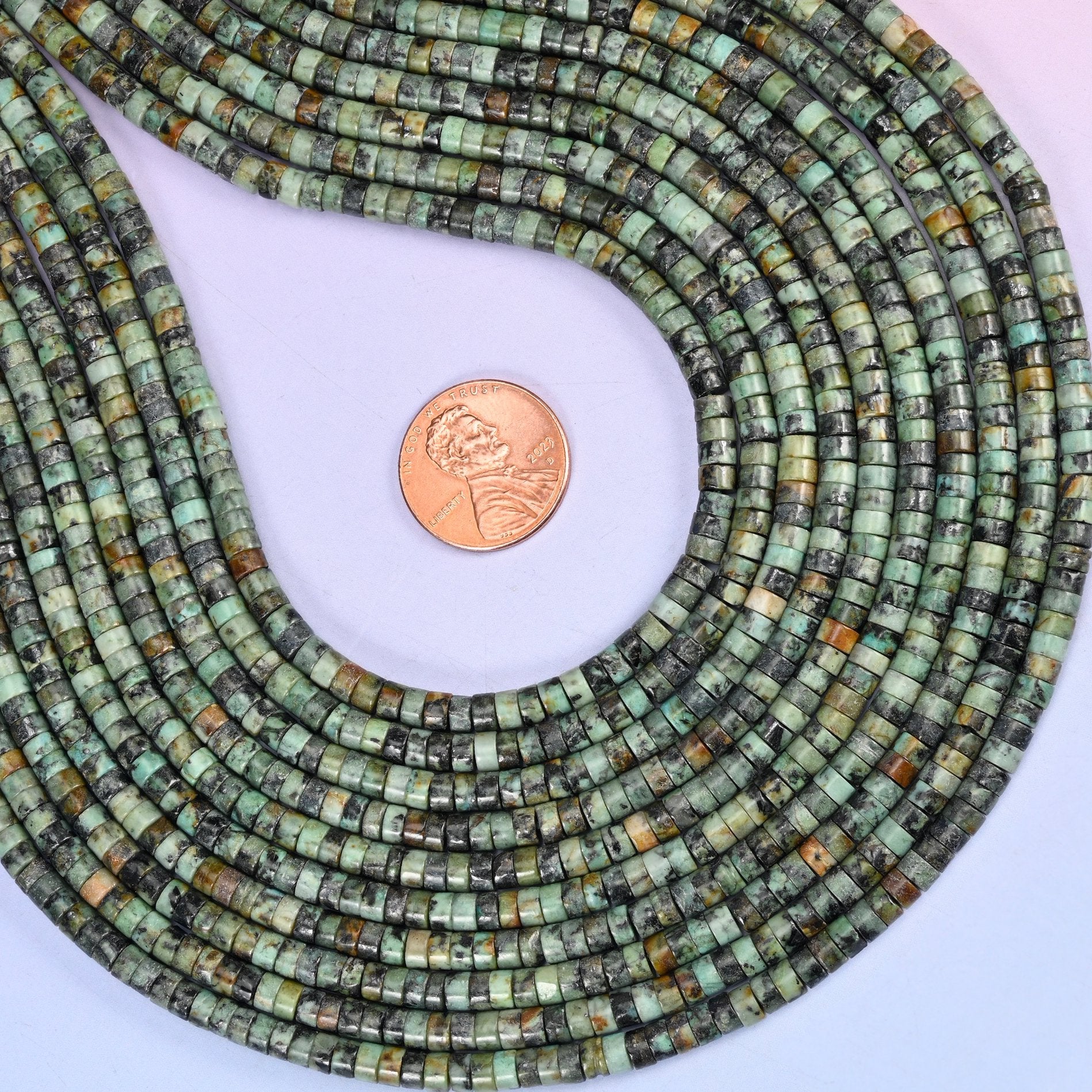 African Howlite Smooth Heishi Disc Beads, approximately 180 beads per strand