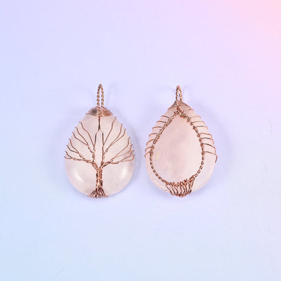 Teardrop Crystal Pendant with Copper Wired Tree in rose quartz, front and back pair with the copper wrapping visible along the edges of the stone.