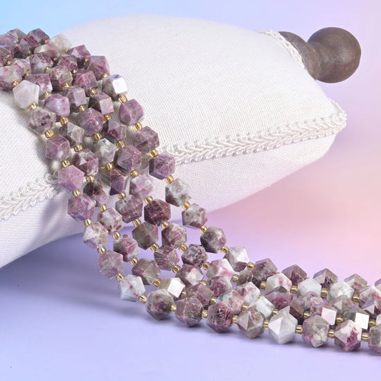 10mm diamond cut beads with facets meeting in a crisp ridge.