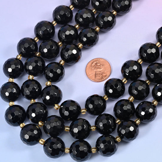 Black Onyx Faceted Round Beads 16mm, approximately 21 beads per strand