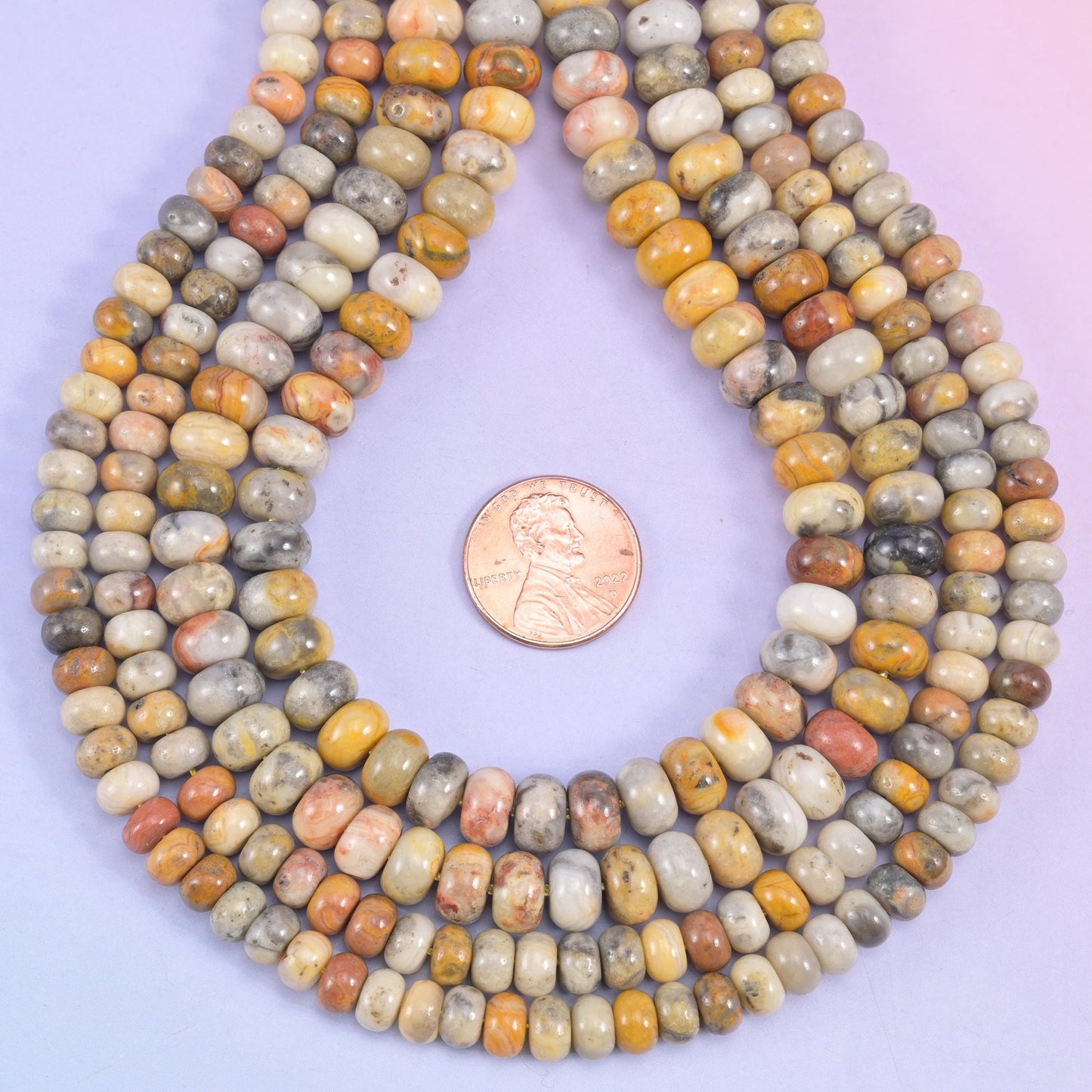 Crazy Lace Agate rondelle beads, approximately 90 beads per strand