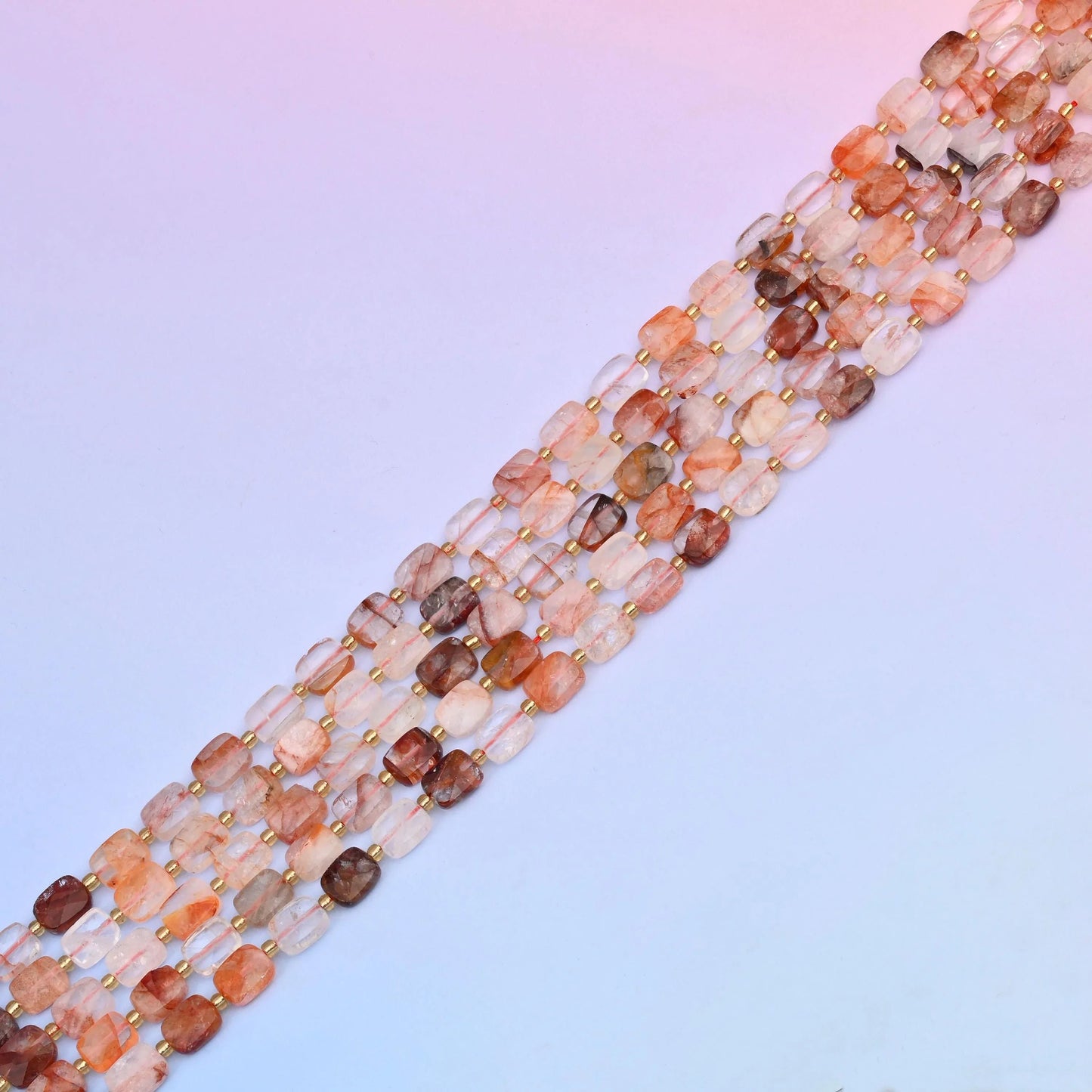 Red hematoid quartz beads with rusty red and warm brown inclusions