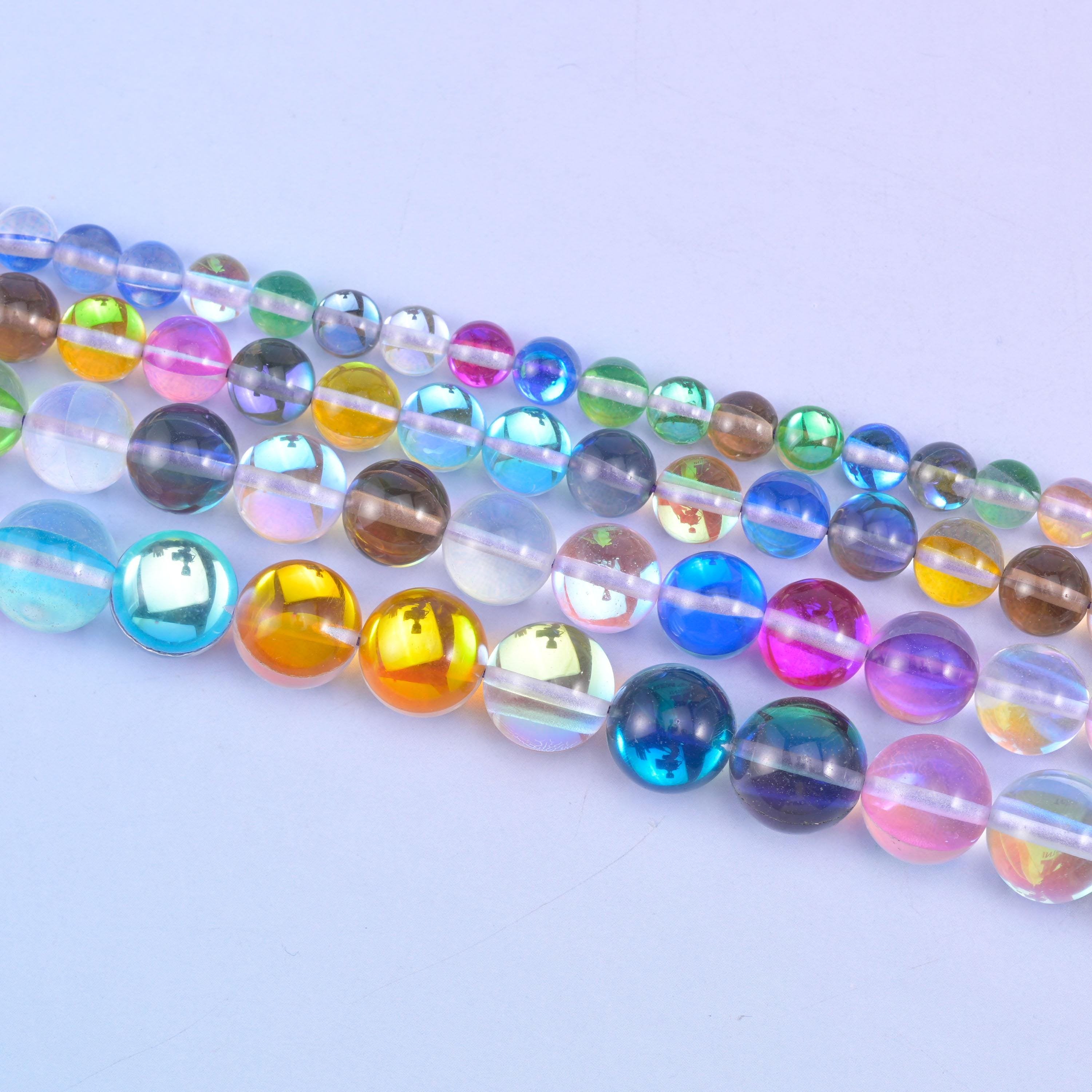 Rainbow glass beads in mixed candy pink, sky blue, amber and violet tones