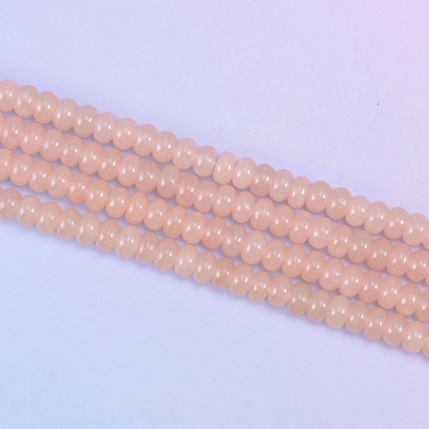Soft Pink Dyed Jade beads, glossy and semi-translucent