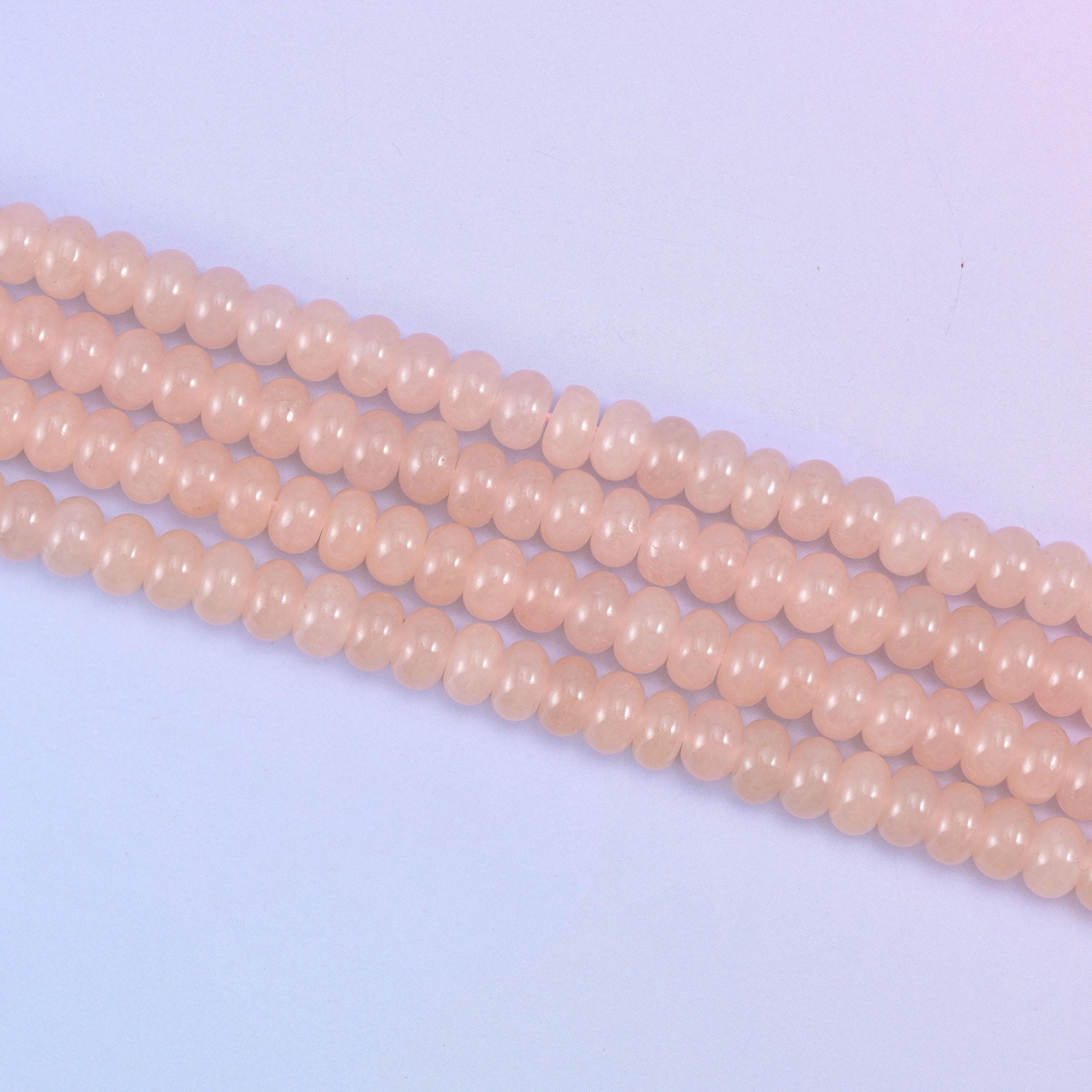 Soft Pink Dyed Jade beads, glossy and semi-translucent