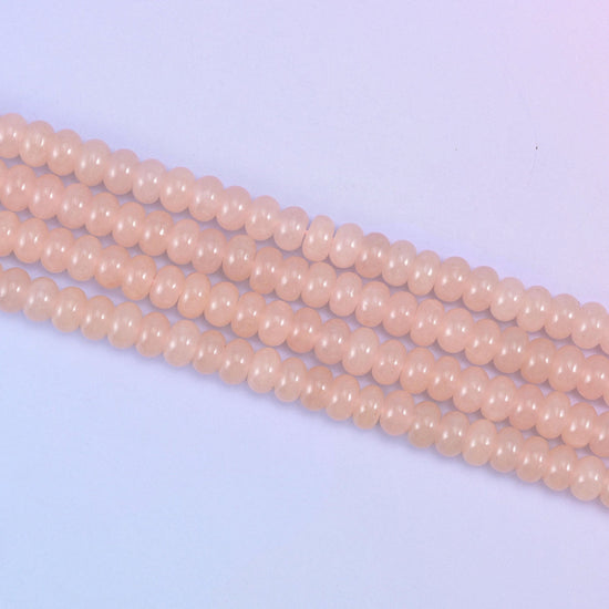 Soft Pink Dyed Jade beads, glossy and semi-translucent