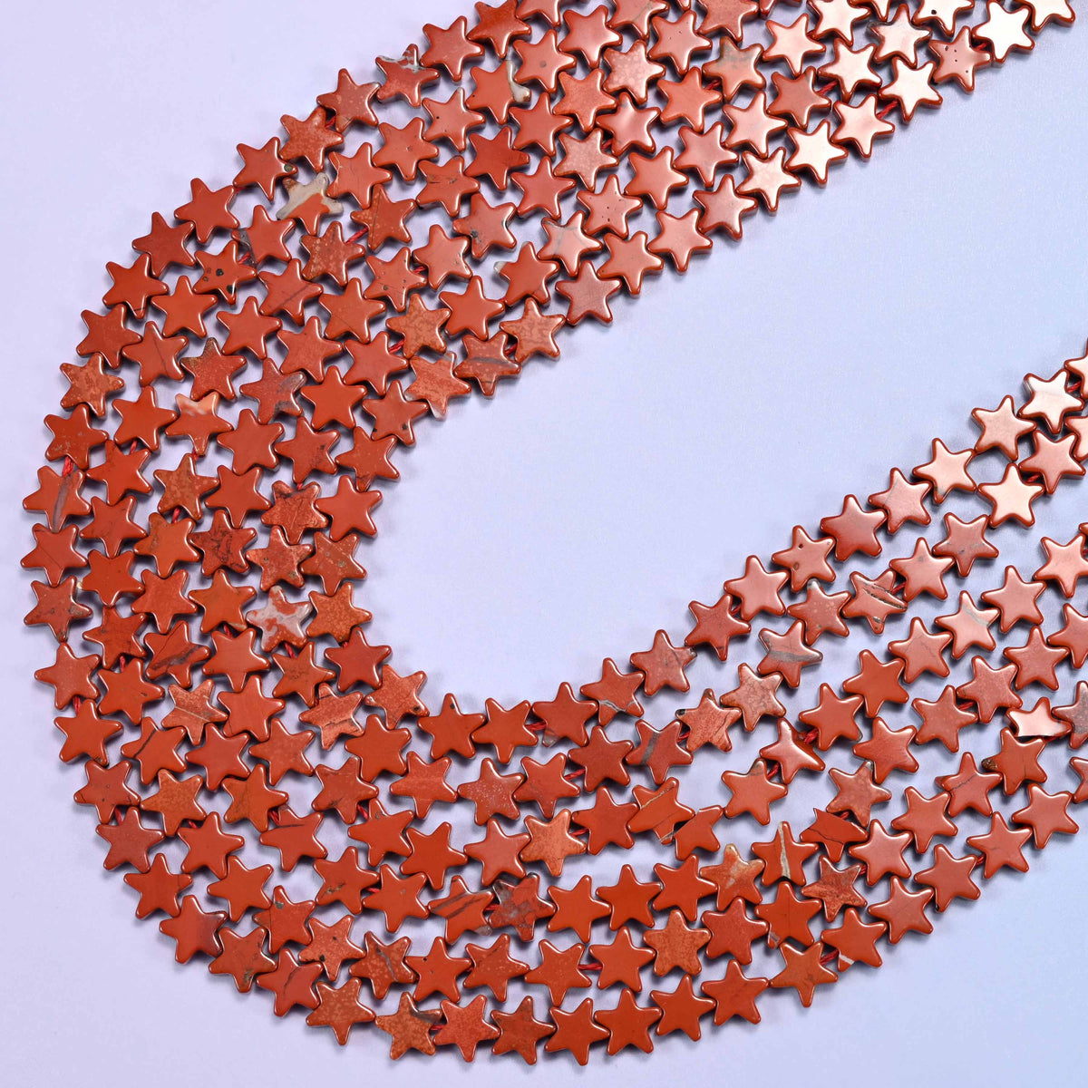 Red jasper beads in warm brick and terracotta red