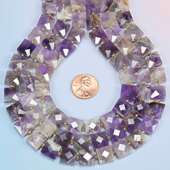 Natural amethyst faceted flat square strands formed into a teardrop loop around a US penny for scale