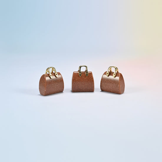 Three gold sandstone purse crystal carvings, 1 inch, brown man-made glass with gold sparkle, gold-tone handle