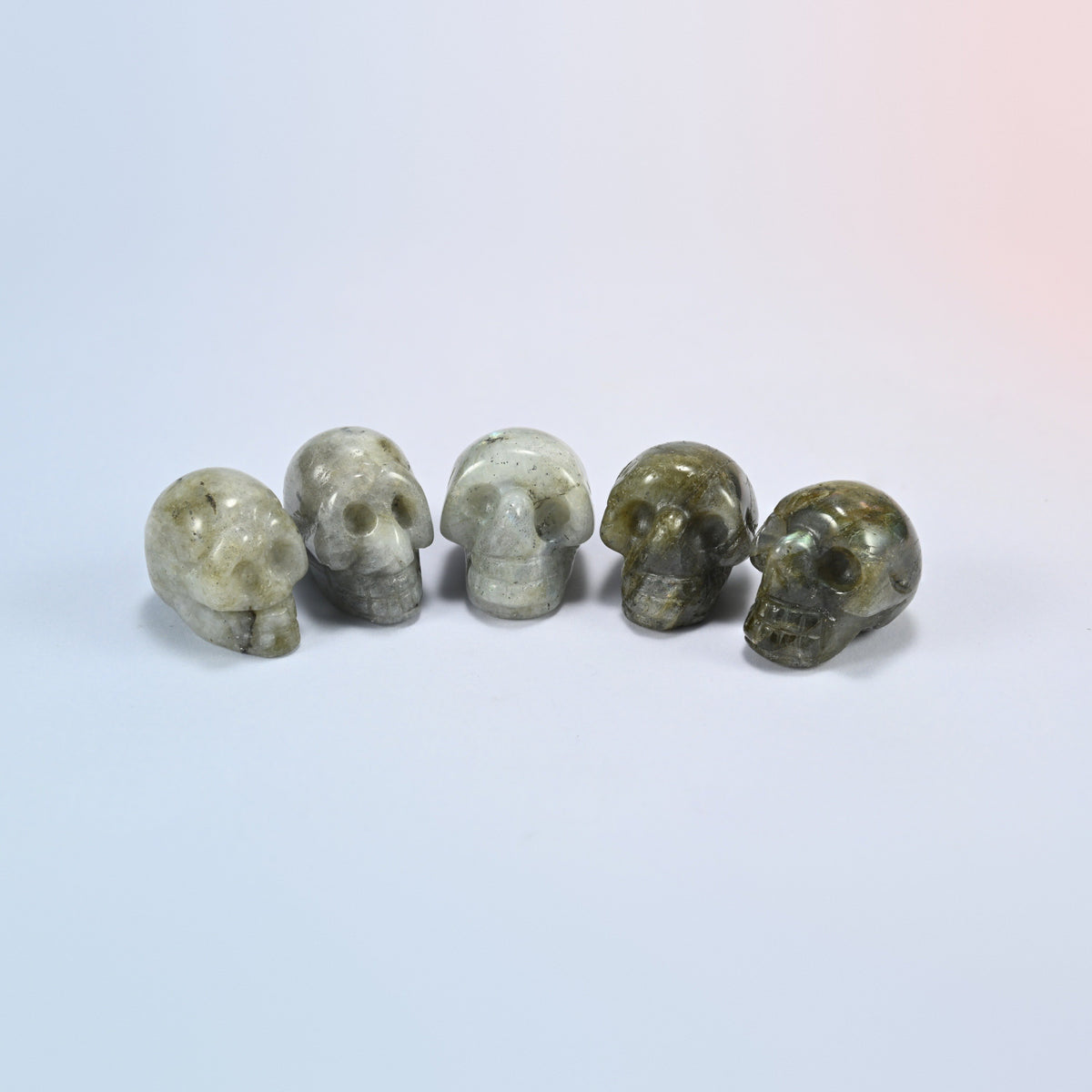 1 inch skull crystal carving in white labradorite, white natural stone with dark speckles