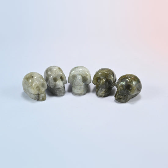 1 inch skull crystal carving in white labradorite, white natural stone with dark speckles