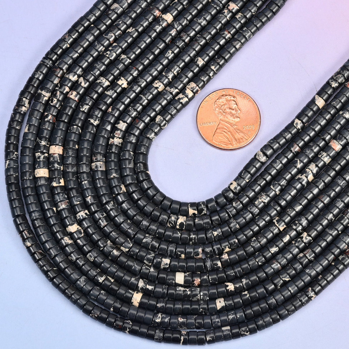 Smooth heishi disc cut sea sediment jasper beads