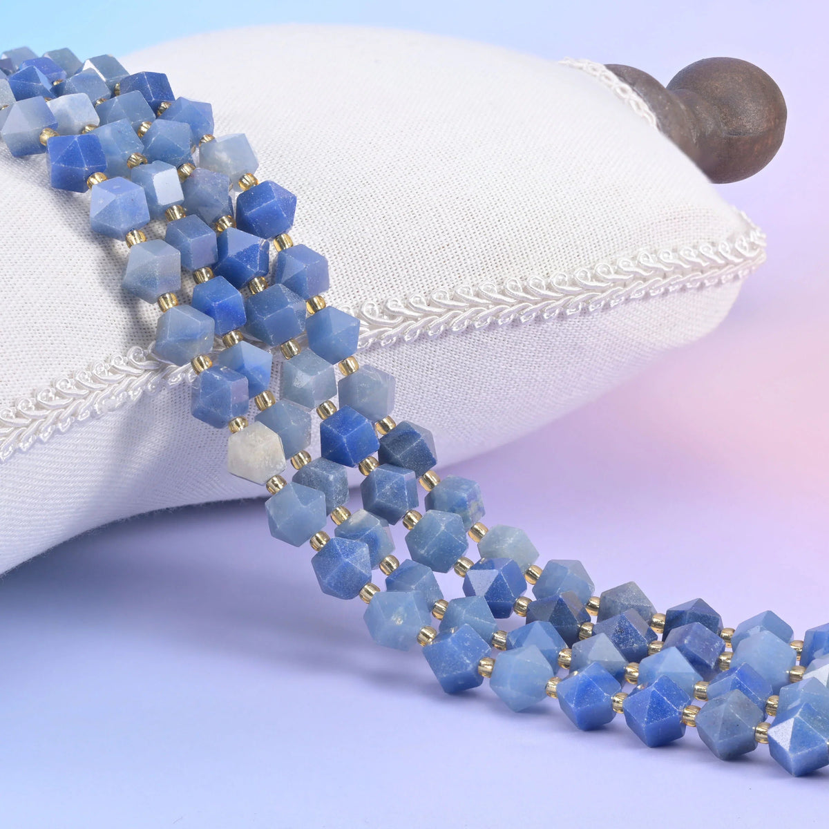 Faceted diamond cut beads, centre drilled, hole approximately 1.0mm.