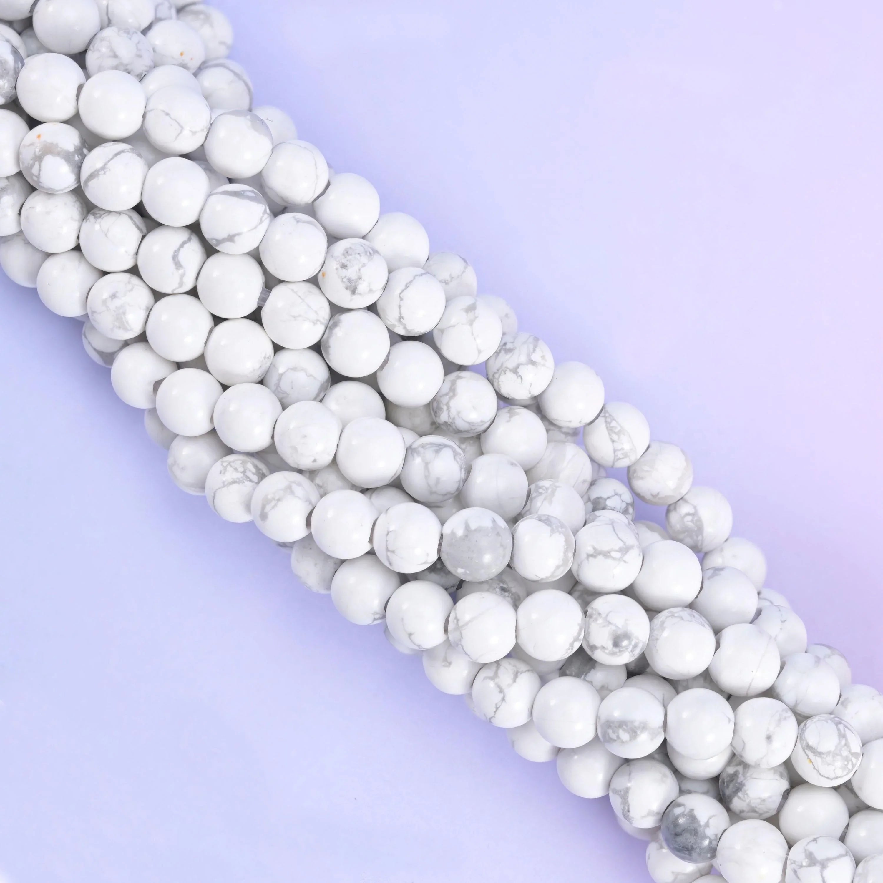 Smooth round cut white howlite beads