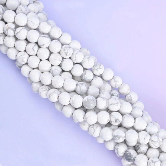 Smooth round cut white howlite beads