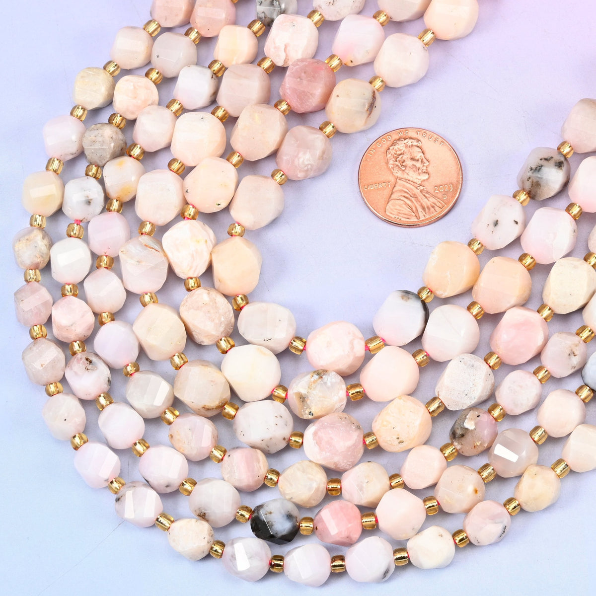 Faceted spiral twist cut natural pink opal beads