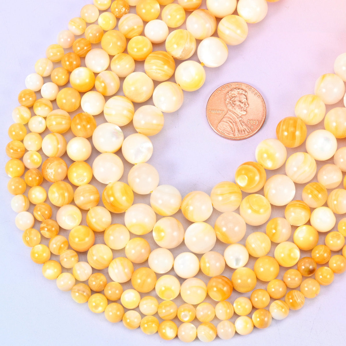 Round cut Yellow Pearl Shell beads