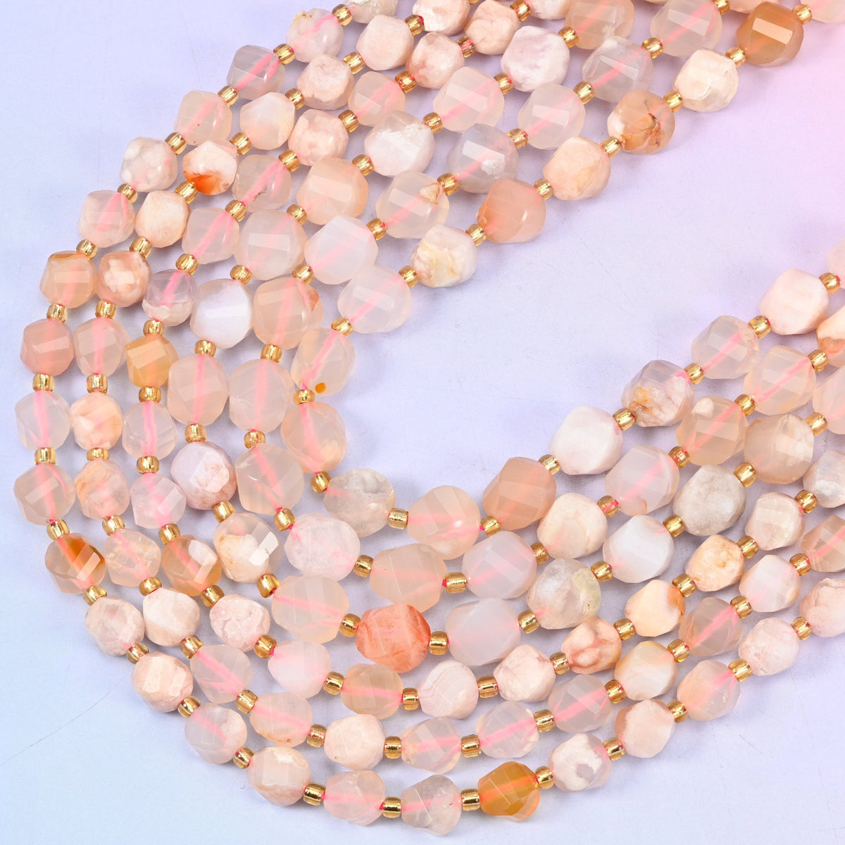 Sakura Flower Agate faceted spiral twist beads, 15 inch strand